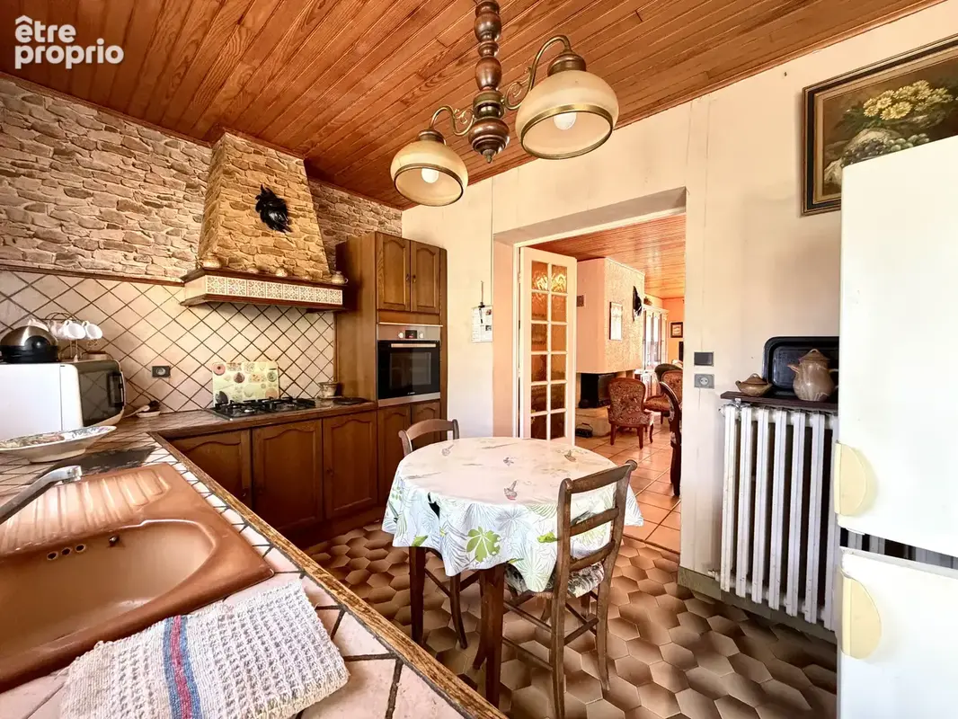 Maison traditionnelle sur deux niveaux avec garage et jardin - photo 8