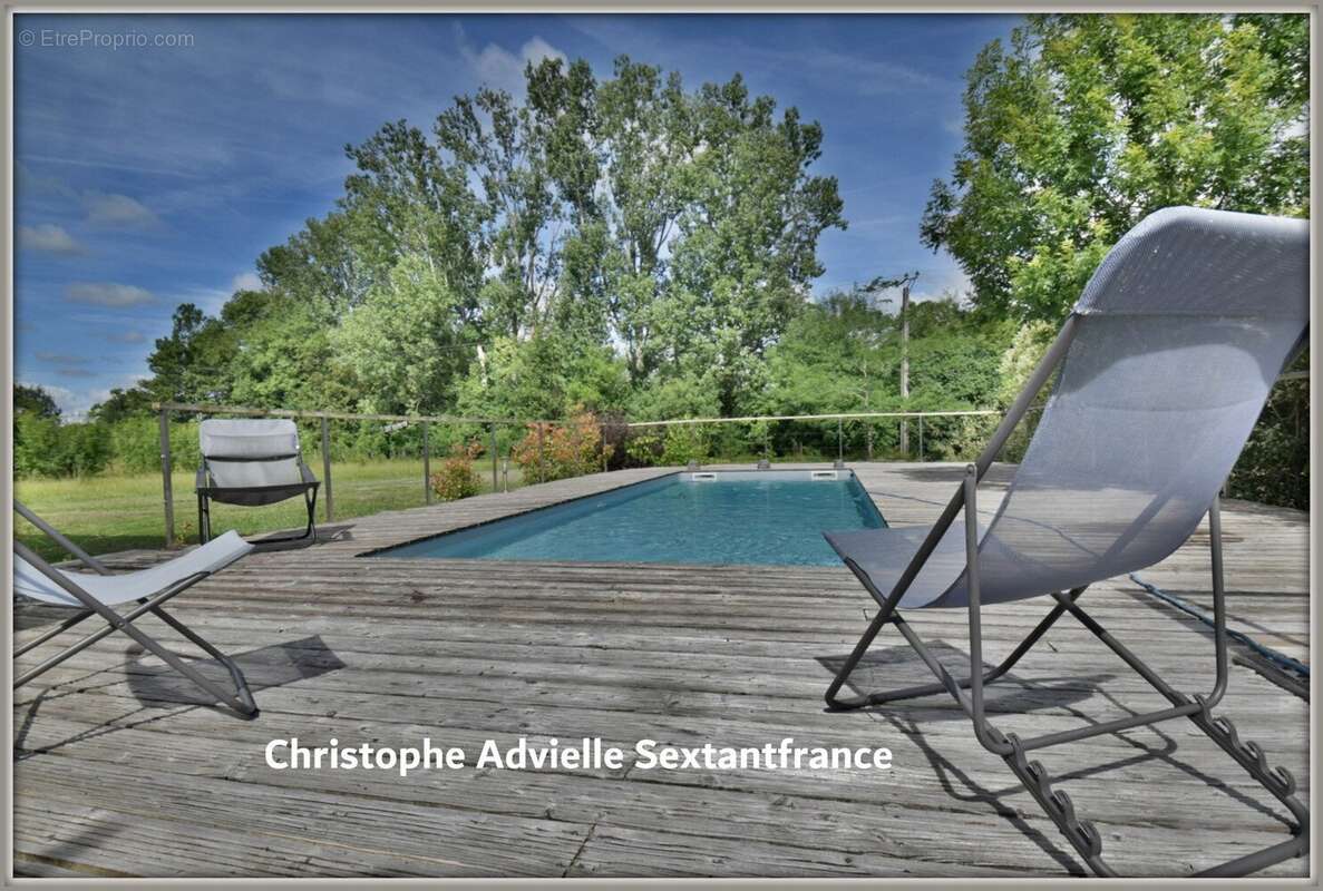 Villa d'architecte ossature bois, plain pied , 4 chambres , piscine, garage et atelier sur 1,6 Ha - photo 16