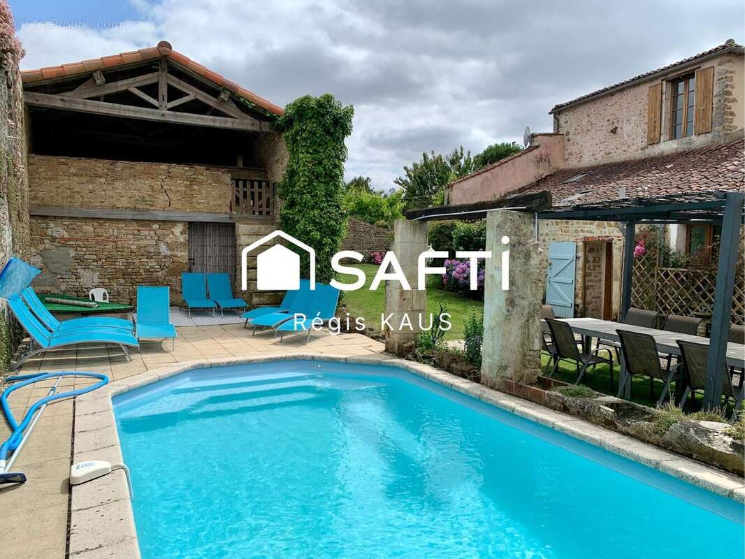 Photo 2 - Maison à LA CHAPELLE-THEMER