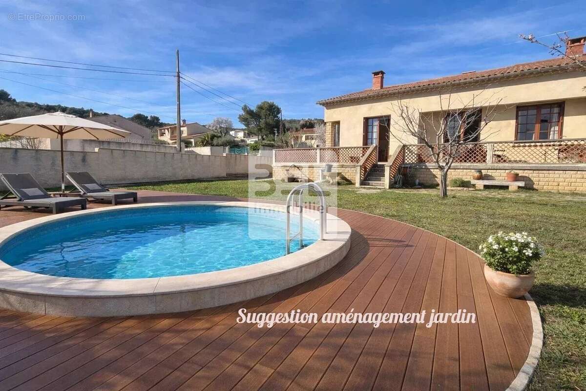 Maison à LAUDUN-L'ARDOISE