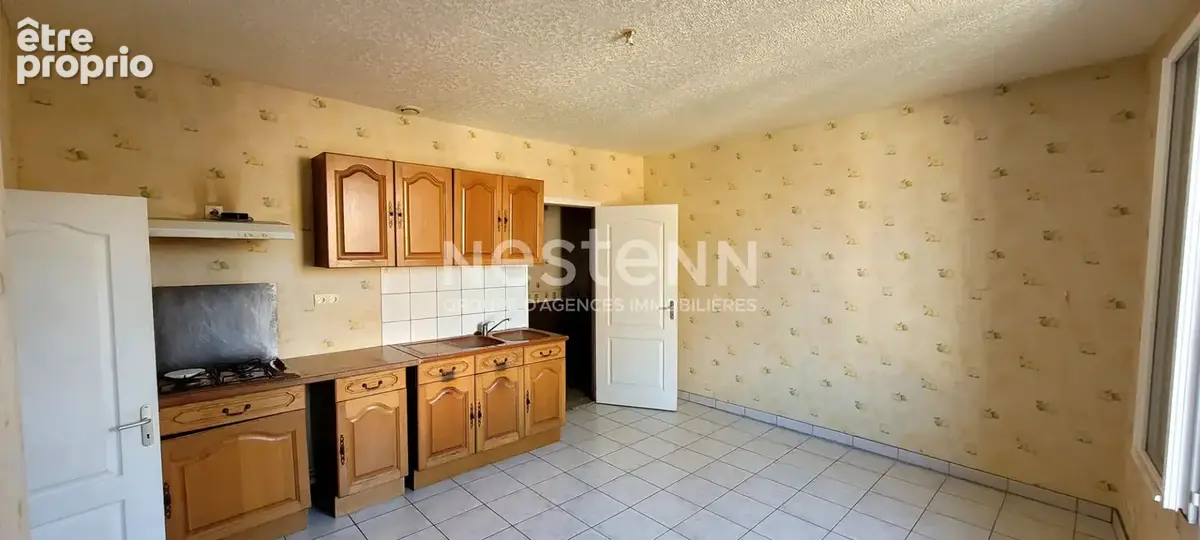Immeuble mixte : boulangerie louée + appartement : 251 m² utiles + annexes - photo 3