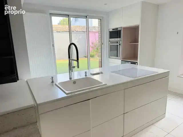 ORLEANS- MURLINS- Maison de ville entièrement rénovée avec un terrain arboré de 1062m2 - photo 2