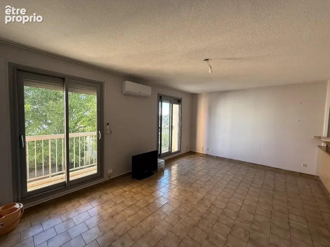 Appartement T4 avec balcon,ascenceur, cave et parking - photo 3