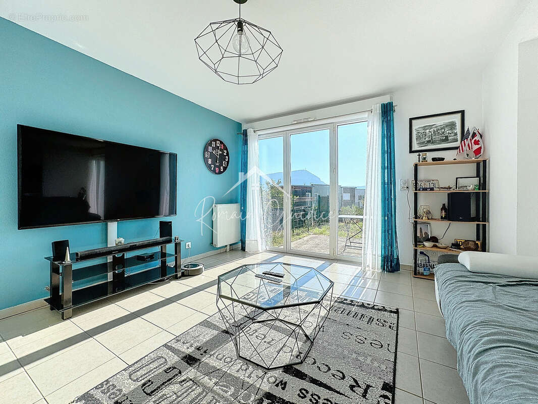 Appartement f3 66 m2 avec jardin et parking privé - photo 2