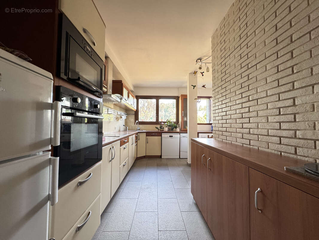 Appartement - 117,35 m2 - 5 pièces - photo 12