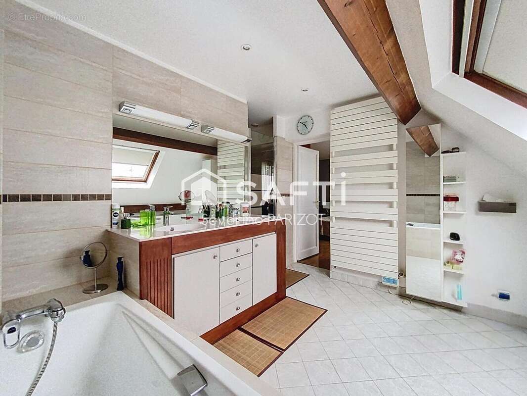 Photo 8 - Maison à VILLEMOMBLE