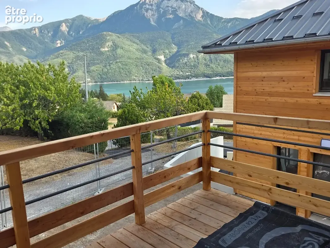 Appartement à vendre 4 pièces ,vue  Lac et Montagnes sur SAVINES LE LAC (05) , Dans une résidence en construction style villa  p - photo 4
