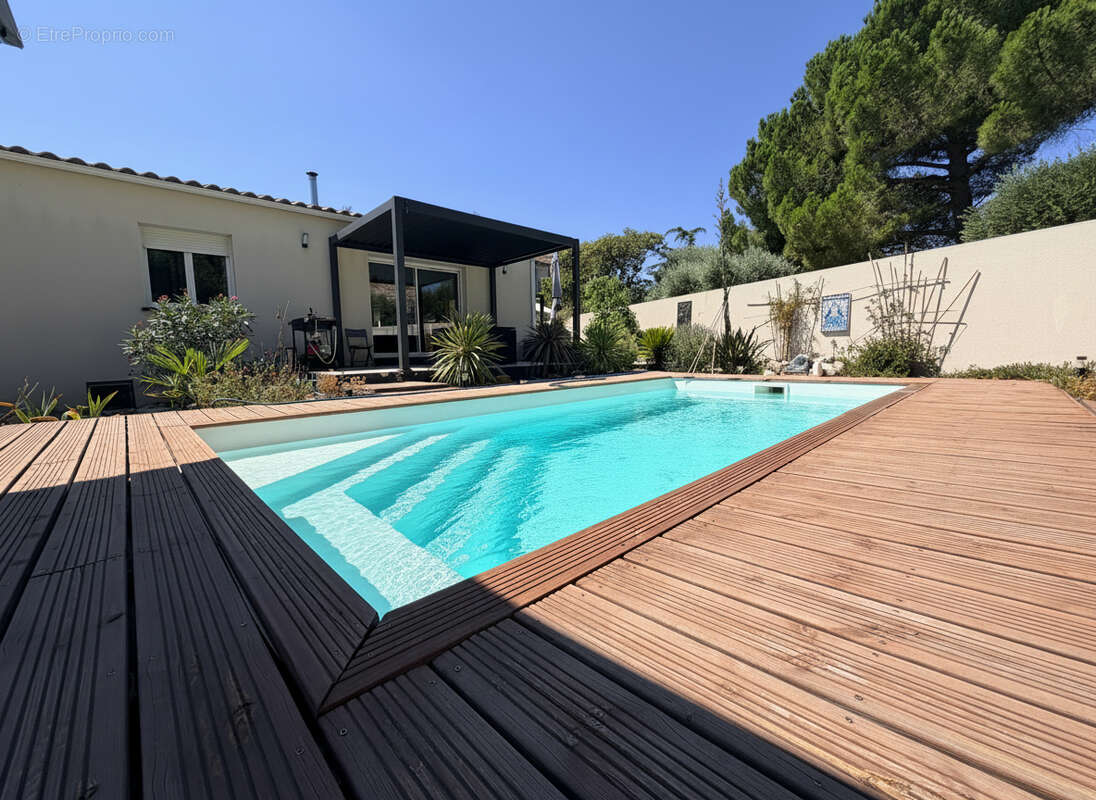 Maison plain pied T4  avec piscine et garage - photo 14