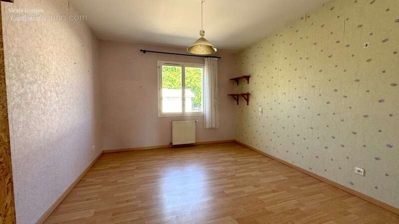Maison de plain-pied – faible entretien, garage communicant et véranda chauffée - photo 8
