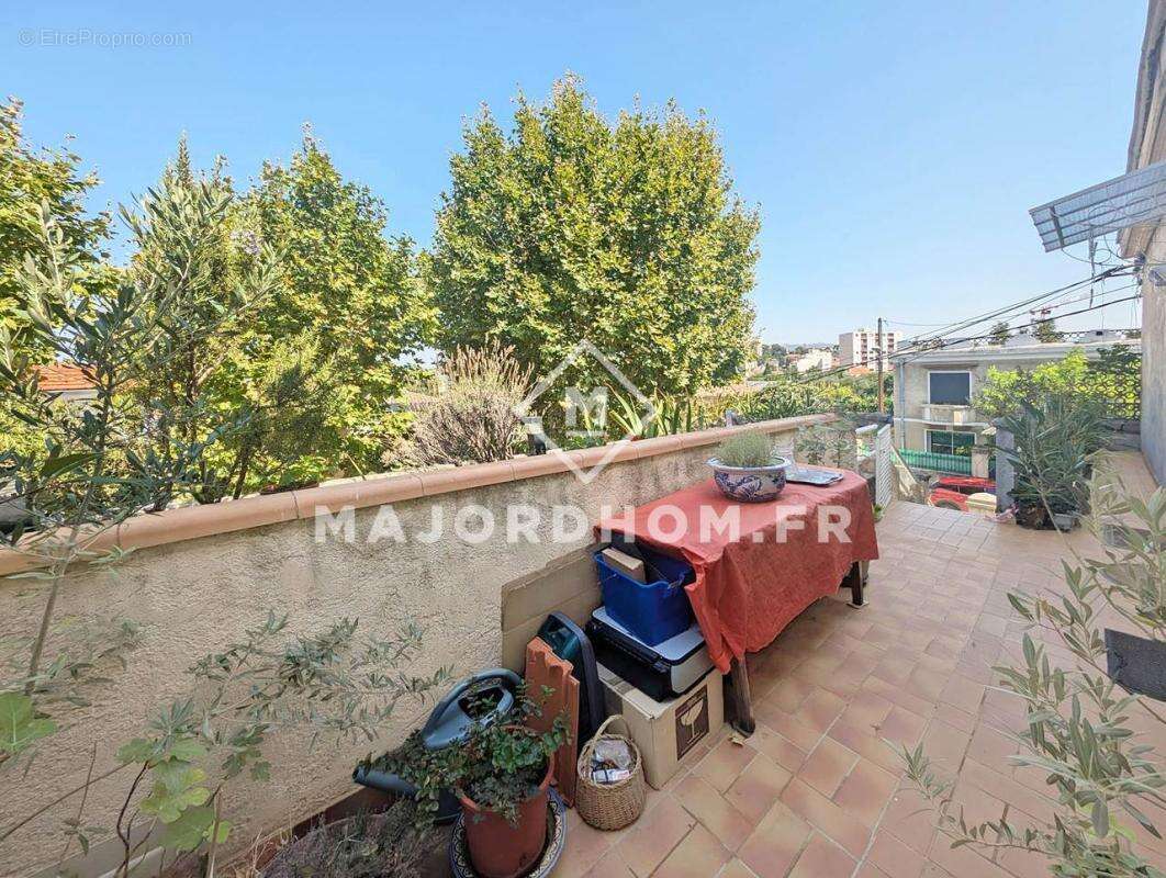 Exclusivité Vente bel appartement type 5 de 115 m2 lumineux en dernier étage avec terrasse et garage 13004 Marseille - photo 2