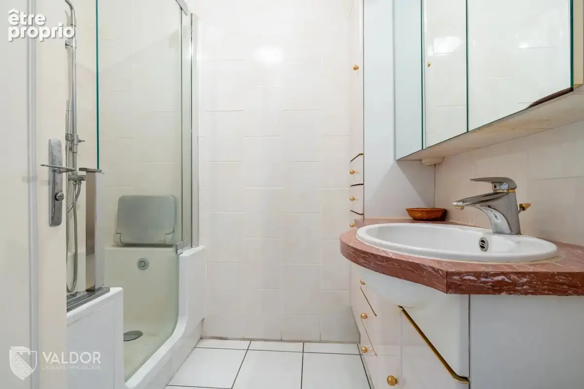 appartement T4 – 105 m² – 3 chambres – Balcon – Ascenseur – 3ème étage - photo 14