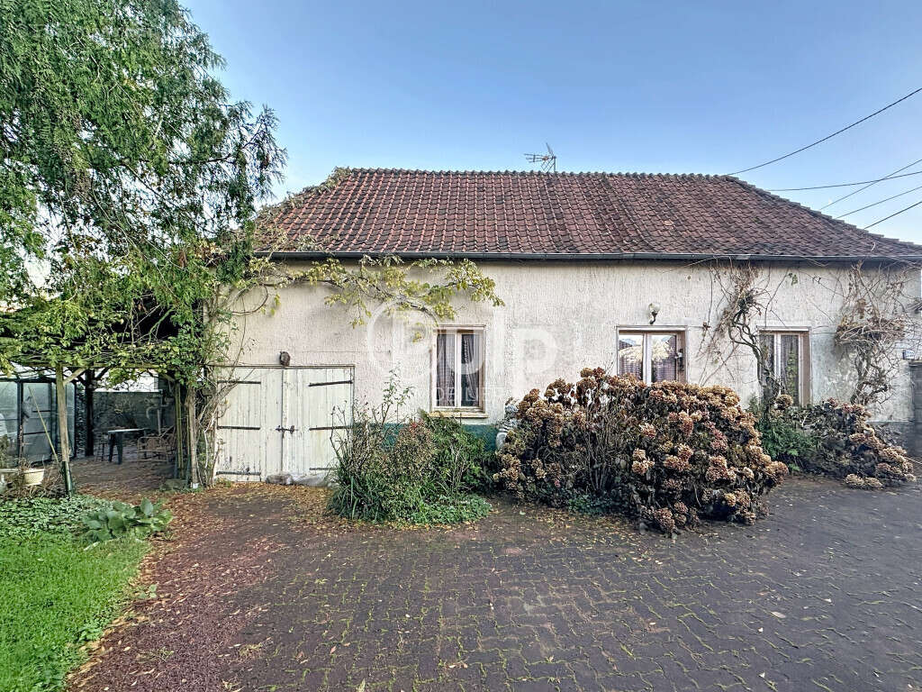 Maison à AUBROMETZ