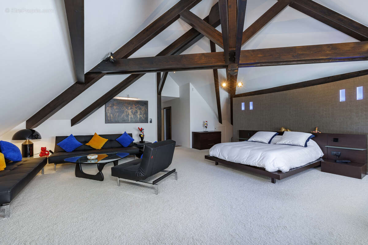 Villa d'exception dominant le lac - photo 10