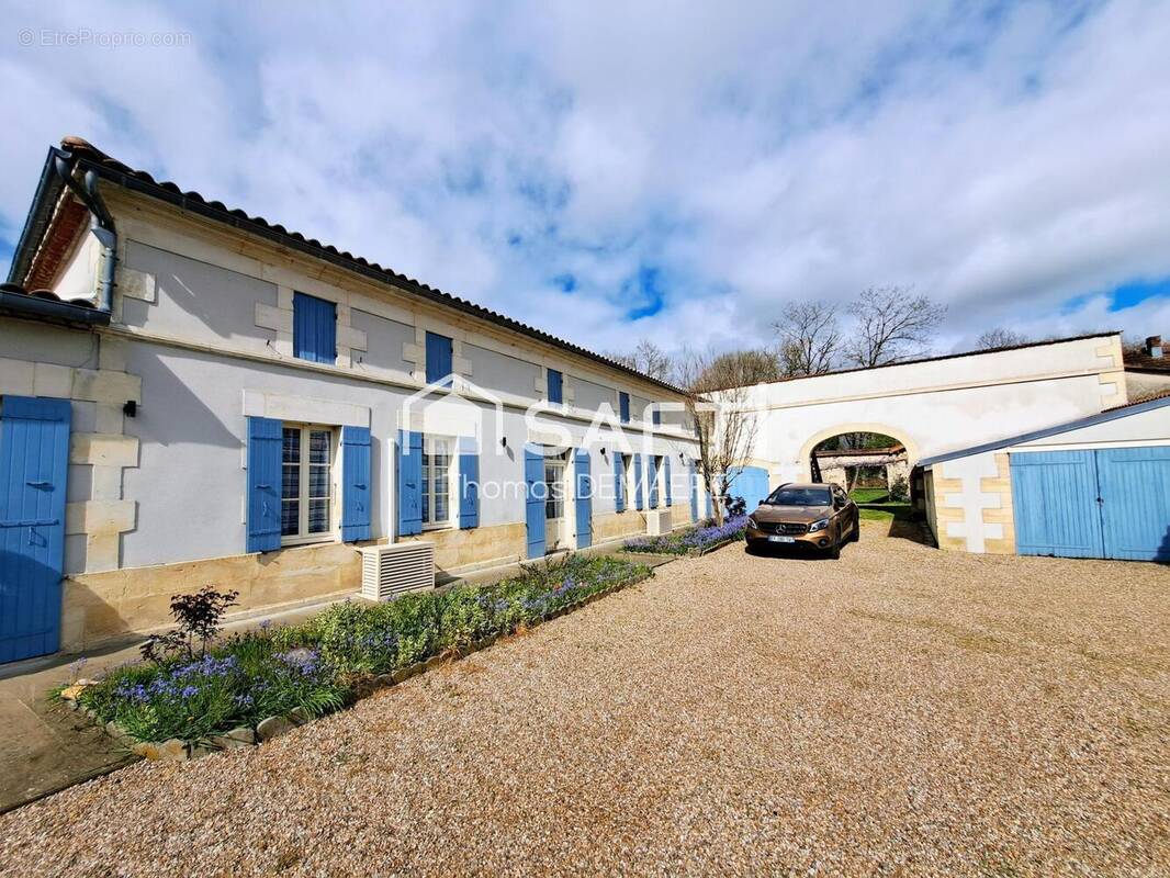 Photo 1 - Maison à BUSSAC-FORET