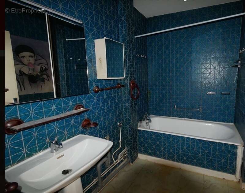 Appartement T5 de 100 m² avec balcon, ascenseur, cave et stationnement – Fort potentiel à Limoges - photo 7