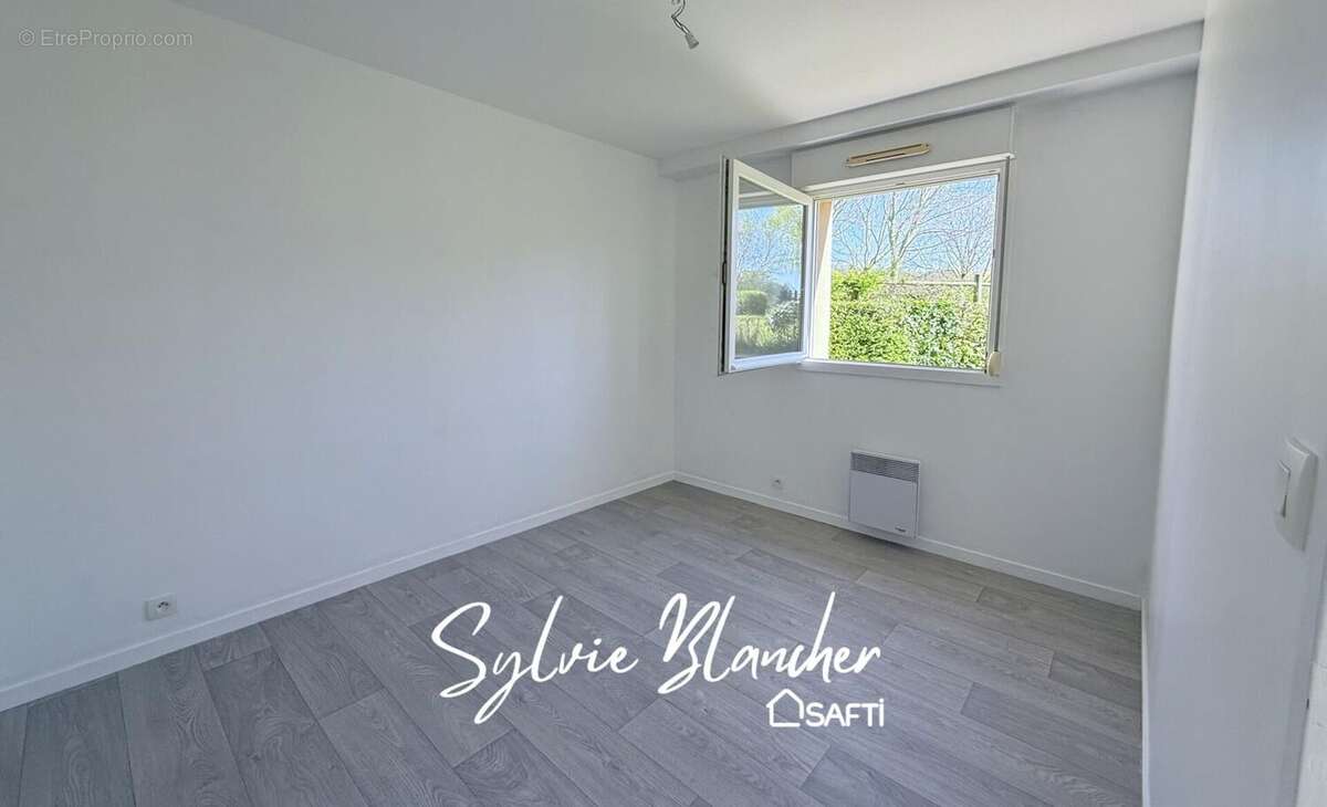 Photo 4 - Appartement à HEROUVILLE-SAINT-CLAIR