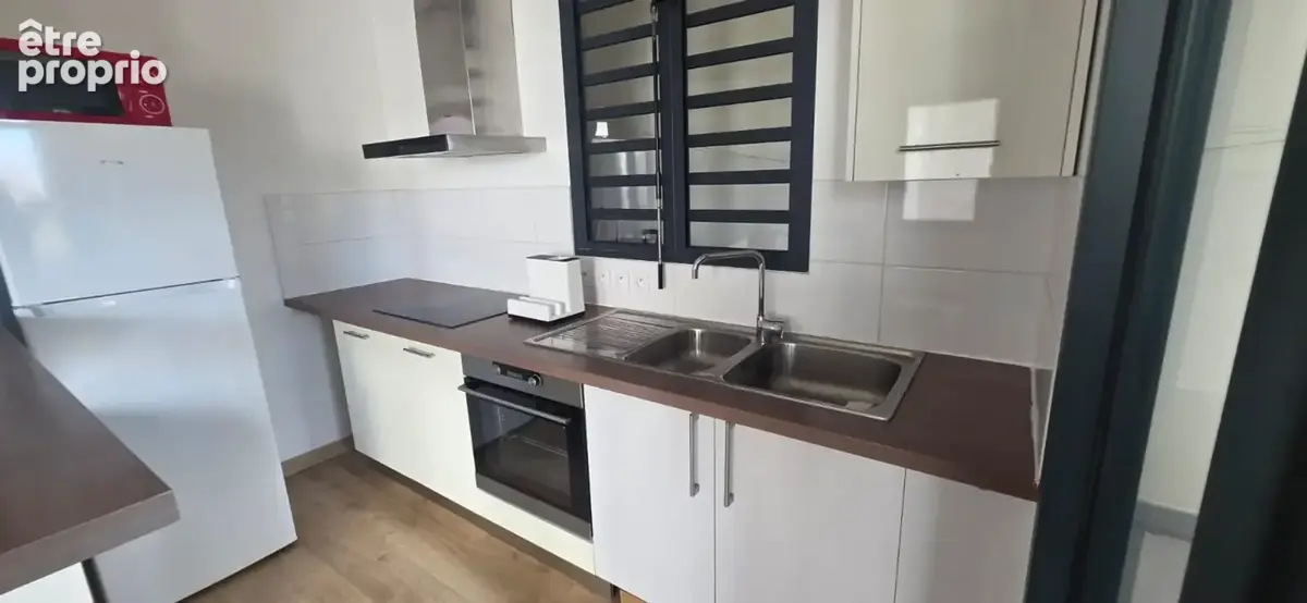 Appartement T3 89m² habitables Cœur de ville La Possession - photo 3