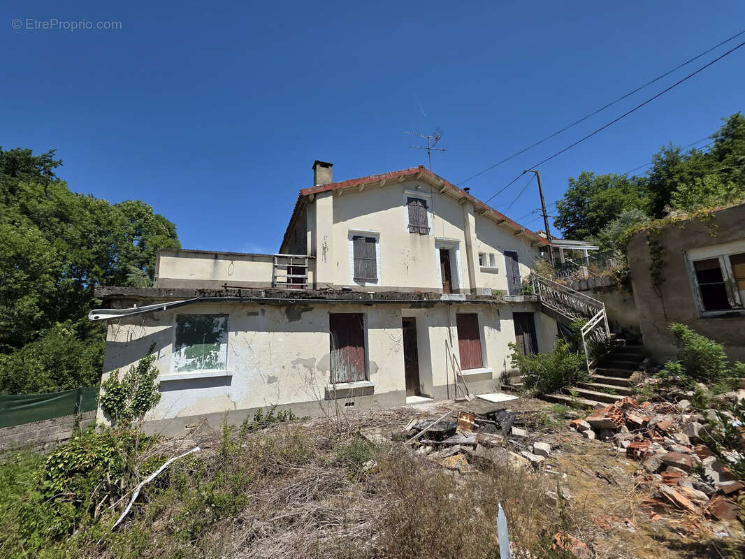 Maison à rénover avec fort potentiel - photo 3