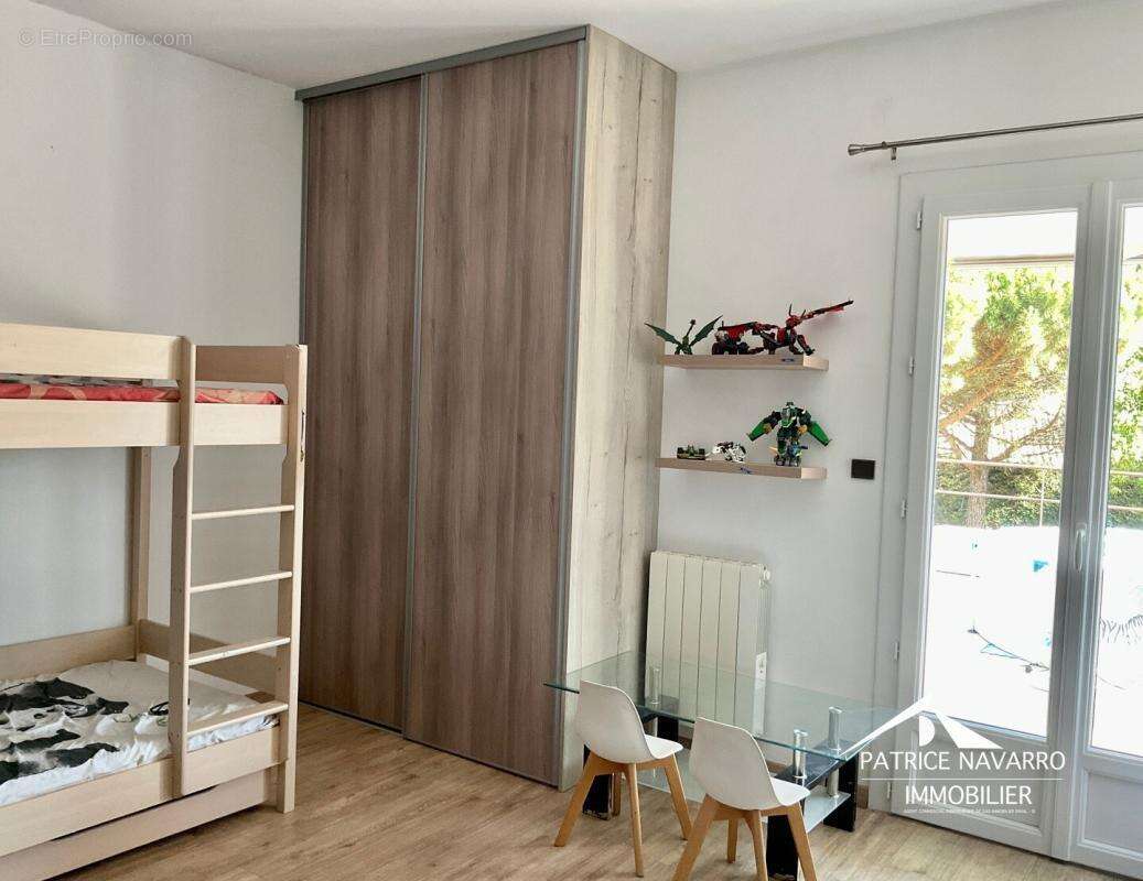 Maison plain-pied 6 pieces 110 m² - photo 9