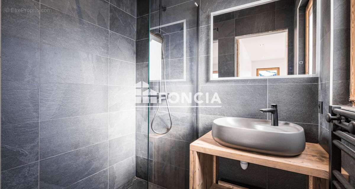 L’élégance alpine en pied de pistes : superbe chalet 4 chambres à Crest-Voland - photo 13