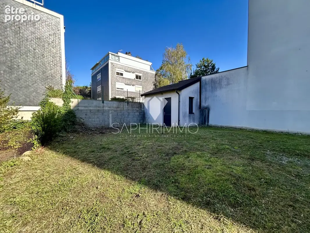 Appartement - 98,58 m2 - 4 pièces - centre-ville de Brive - photo 4