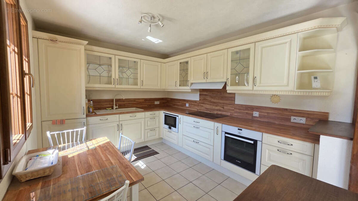 Maison familiale confort plain pied sous sol et  jardin - photo 5
