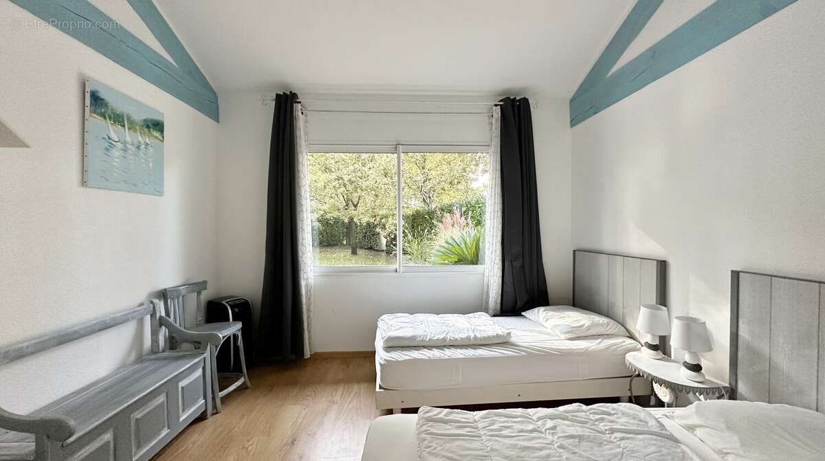 Entre Forêt Landaise et Art de Vivre  Ensemble de deux maisons sur 1638 m² de terrain boisé. - photo 13