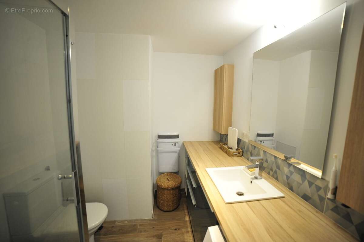 Centre-ville - t3 - photo 10