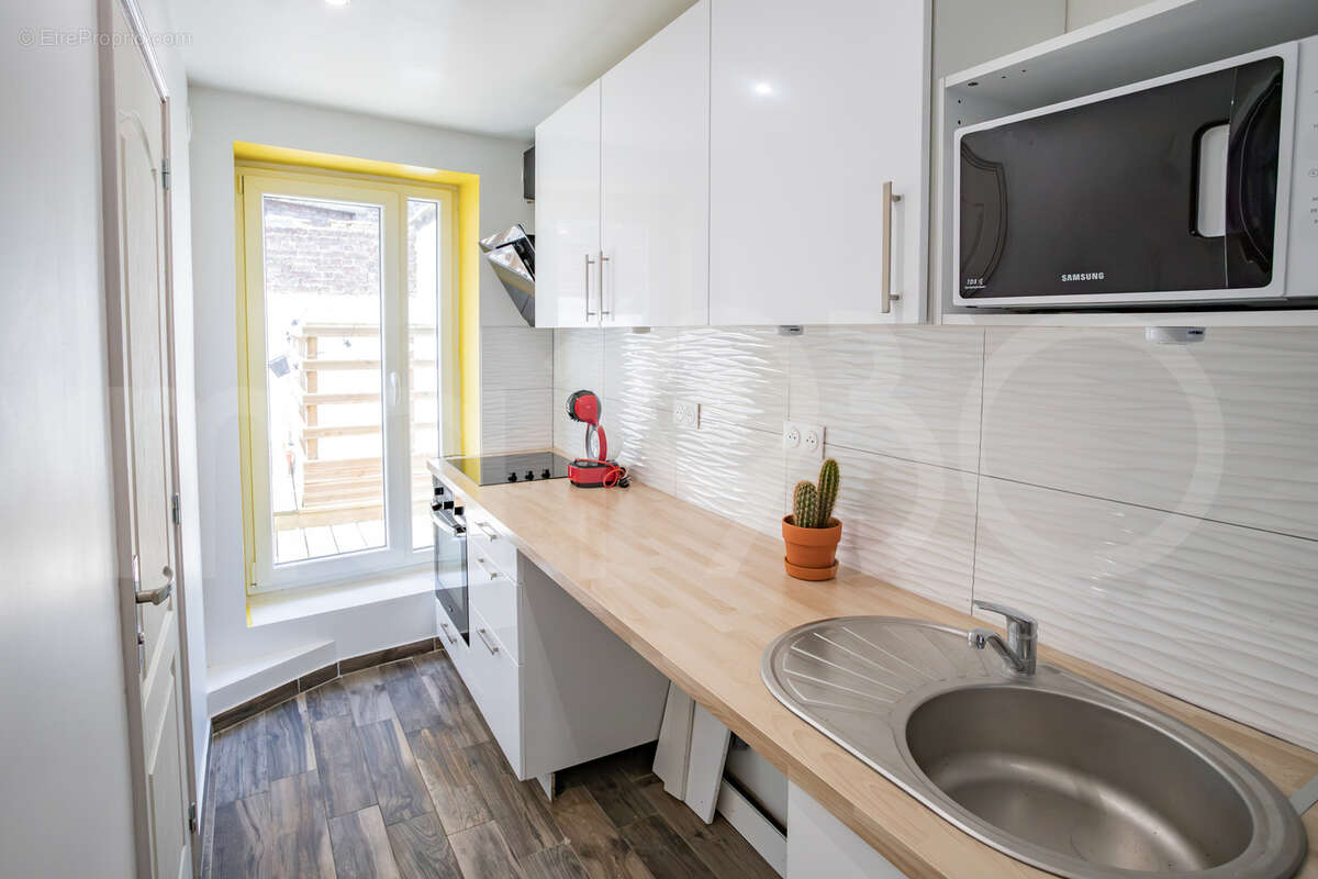 Un triplex avec terrasse en plein centre! - photo 5