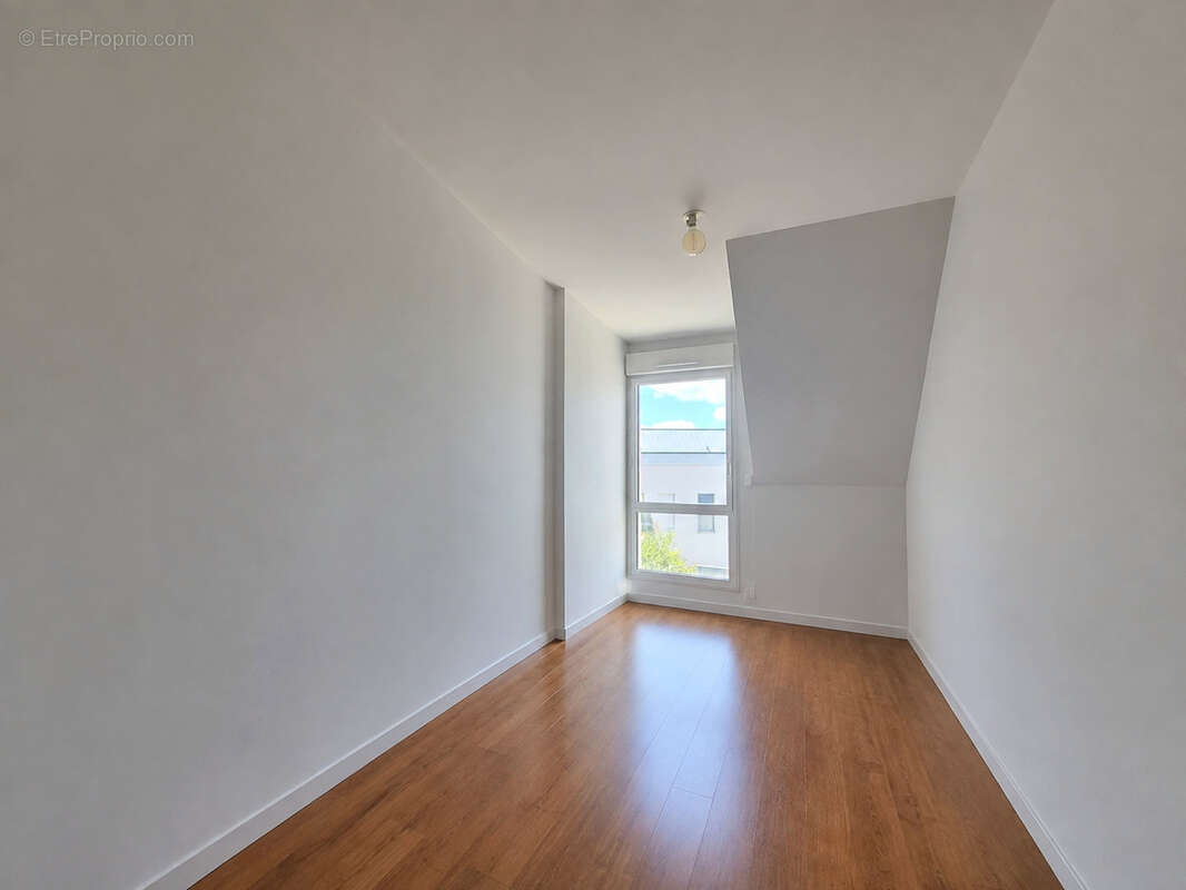 Appartement T3 Saint-Erblon Centre - Ascenseur - Double garage 62.10m2 - photo 12
