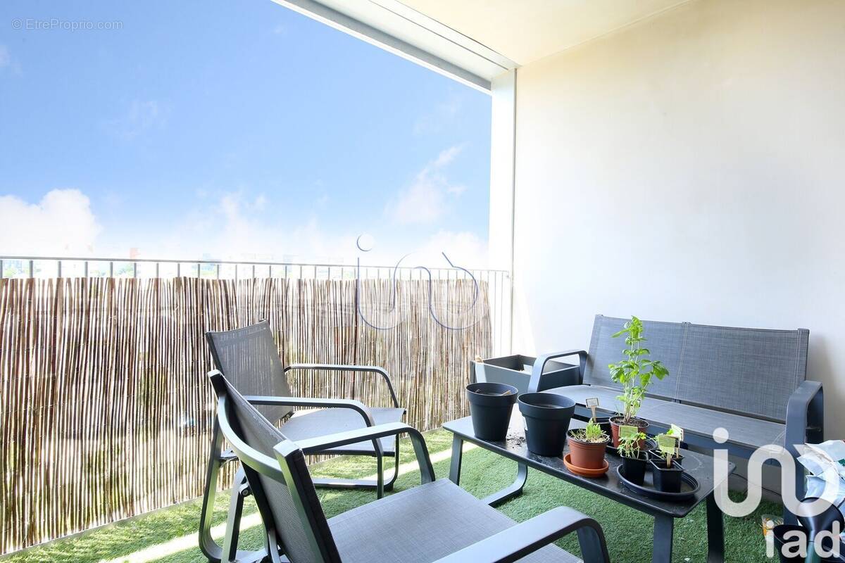 Photo 1 - Appartement à BEAUZELLE