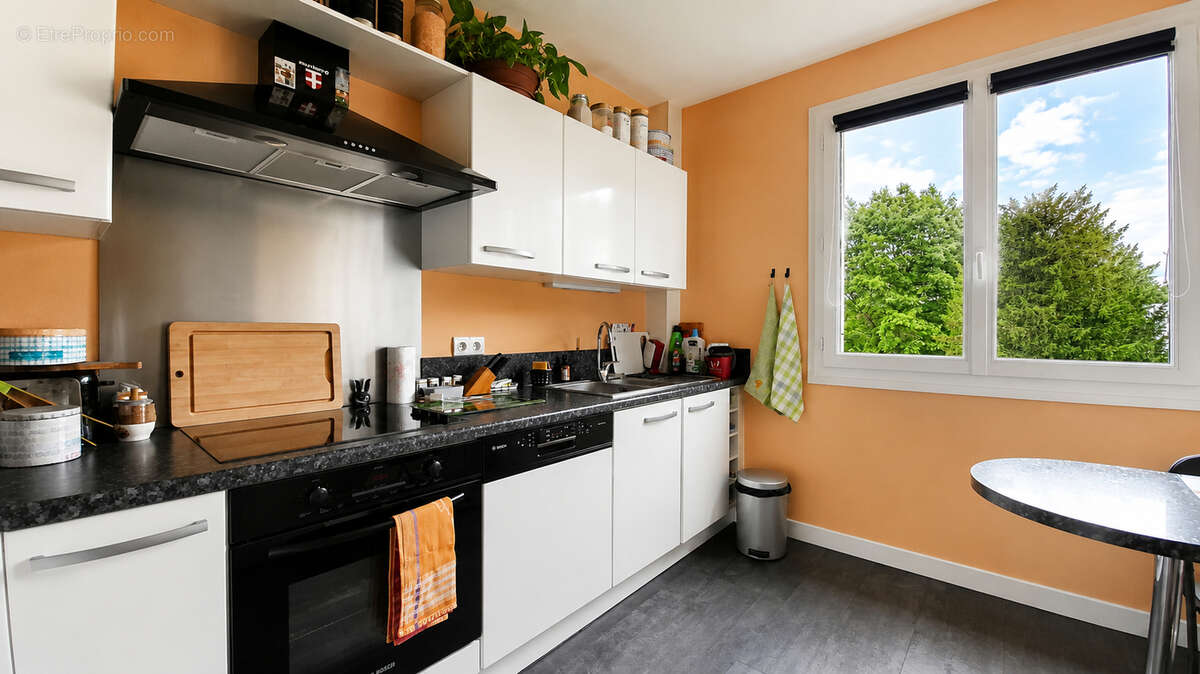 Appartement T4 lumineux et spacieux avec vue sur parc arboré - photo 4