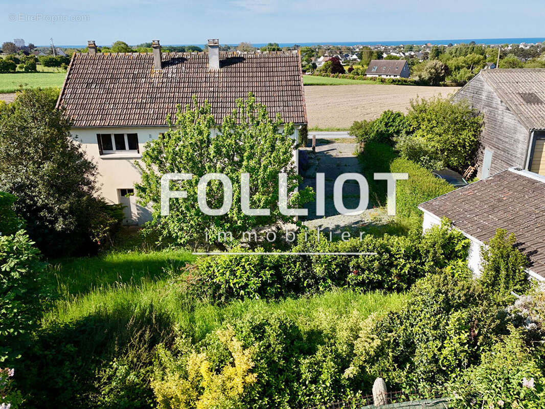 Maison à AGON-COUTAINVILLE