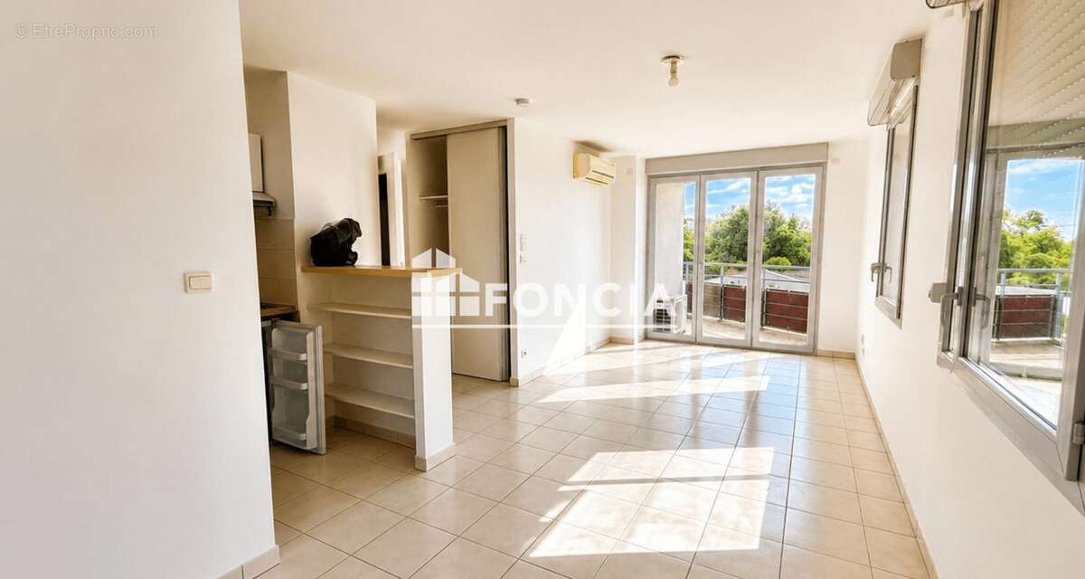 Appartement t1 climatise avec terrasse et parking sous-sol - photo 2