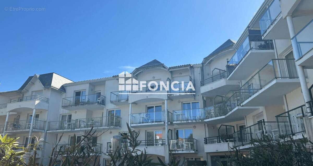 Appartement T4 avec mezzanine, piscine et parking privatif – Un cadre de vie privilégié - photo 14
