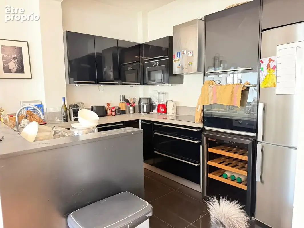 A proximité de la place de l'etoile,appartement de standing de 91,03 m2 de 4 pièces au 5 éme étage avec ascens - photo 9