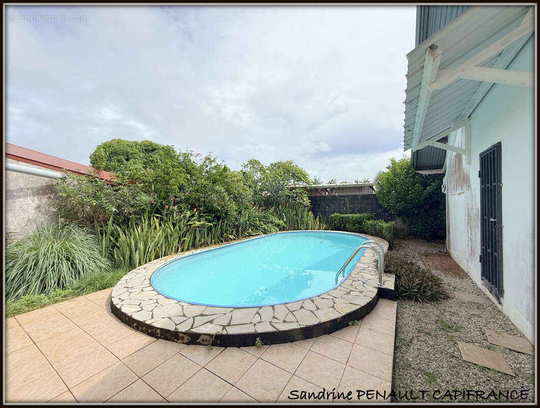 A vendre a kourou (97310) une charmante maison t5 de 106 m² - terrain de 440 m² - au prix de 318 000 € - photo 2