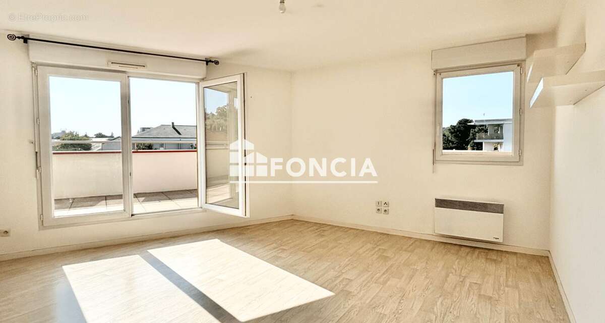 Exclu foncia : appartement 72m2 - terrasse 47m2 - 2 chambres - stationnement couvert - photo 4