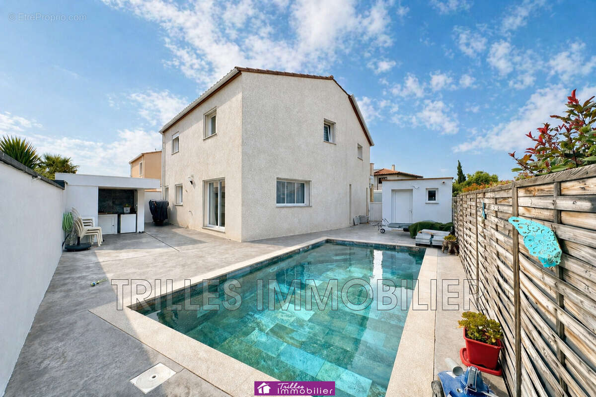 Maison à THEZA