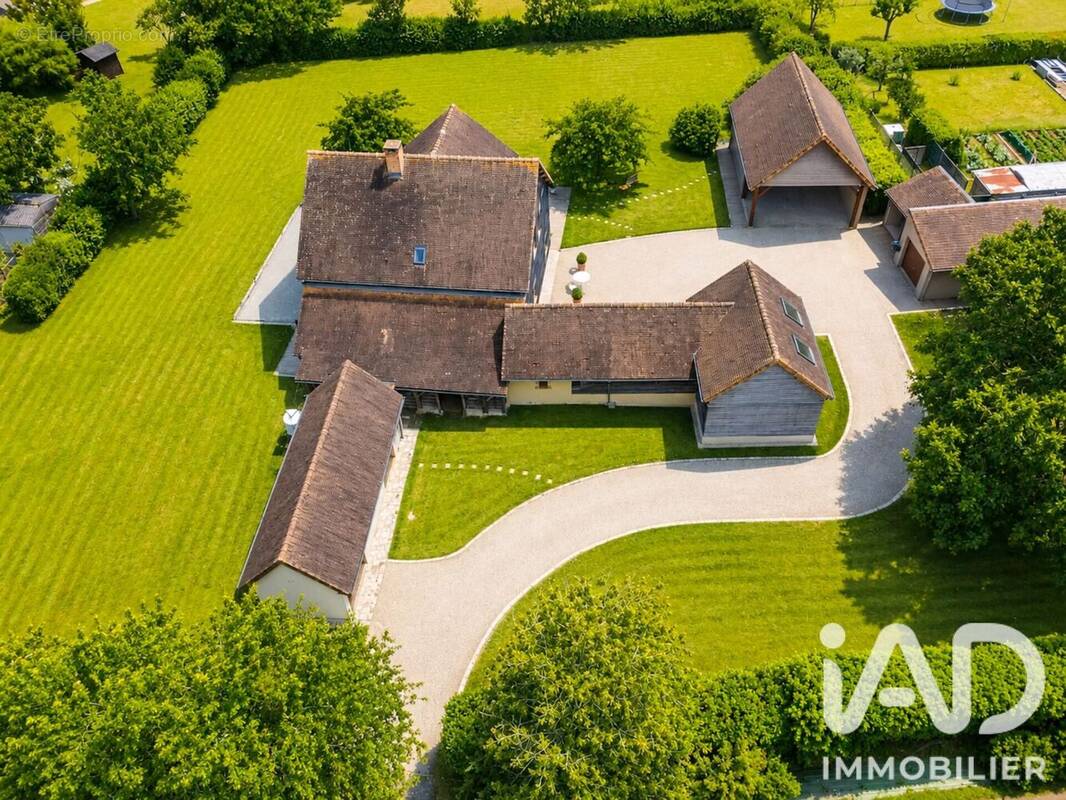Photo 1 - Maison à SAVIGNE-L'EVEQUE