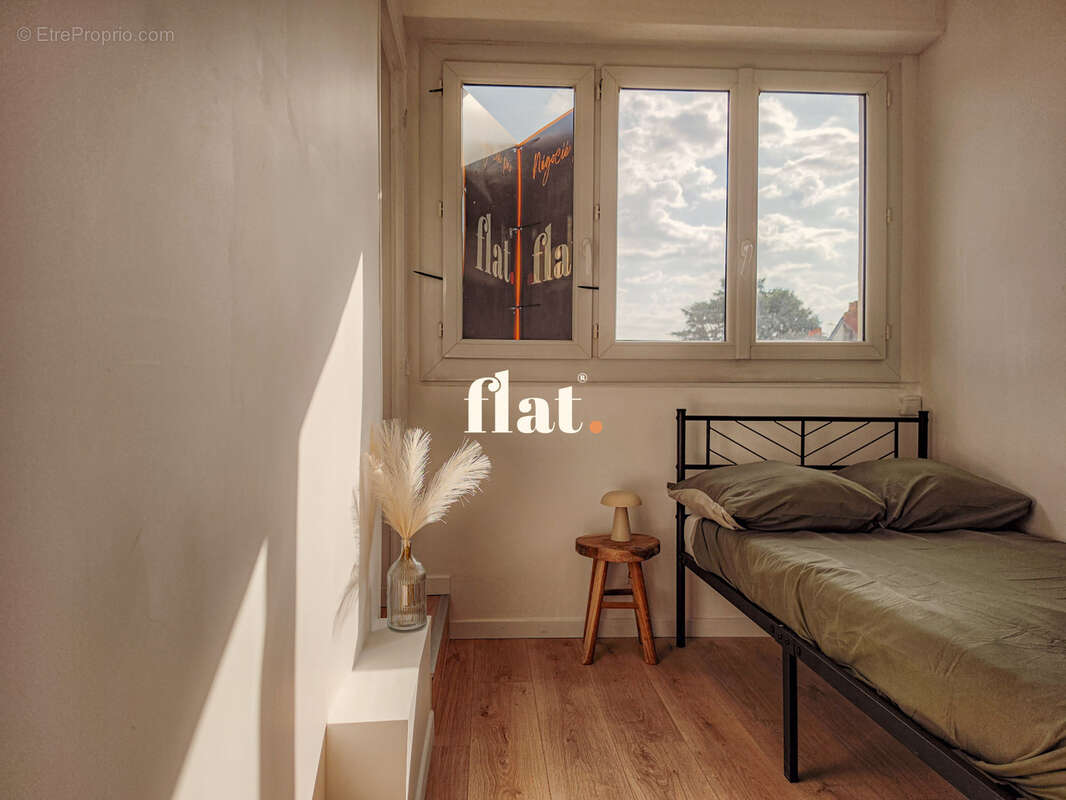 Appartement T3 de 70 m2  - RD POINT DE VANNES - 2 chambres + Cave - photo 12