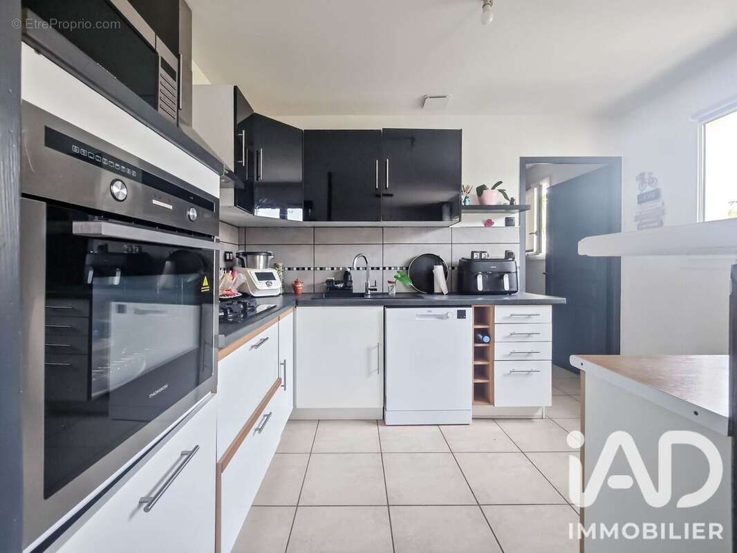 Maison 89 m² à Aiguillon  - photo 6