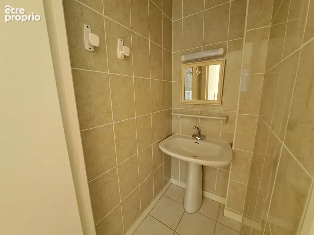 Spacieux appartement T4 de 100,97 m² avec balcon, cave et parking - photo 11