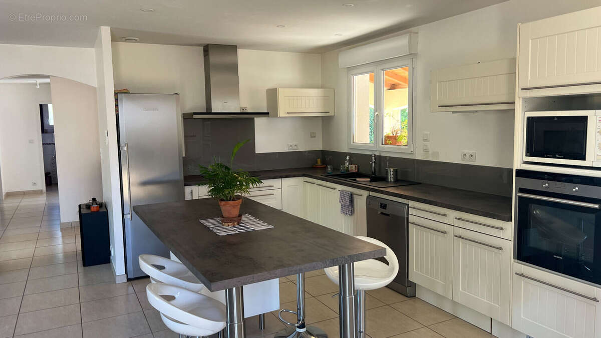Maison Ste Foy De Peyrolieres 5 pièce(s) 112 m2 - photo 3
