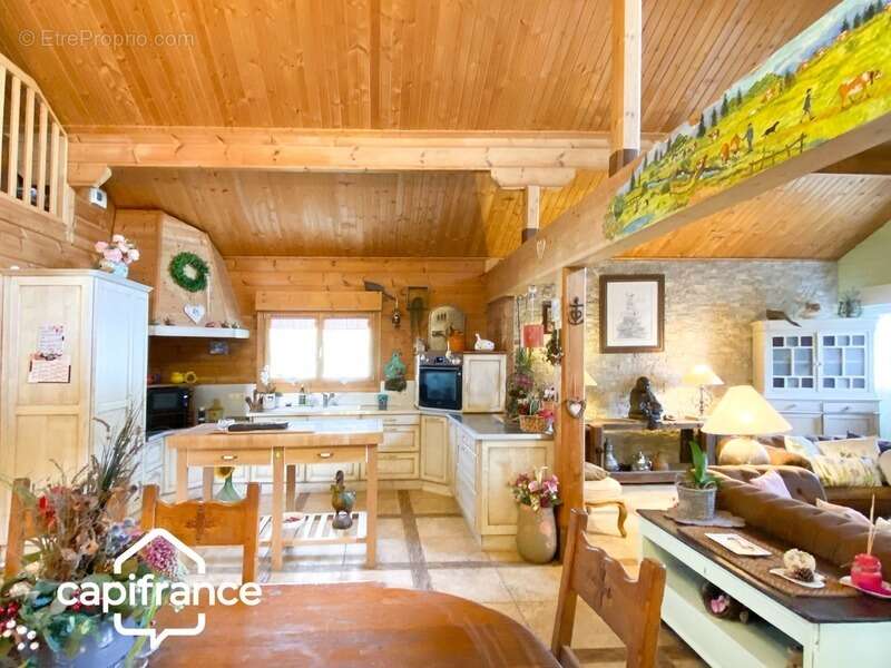 01300 cuzieu maison bois massif type chalet, 146 m² ,plain-pied terrasse, garage,piscine, terrain 1100 m2 - photo 5