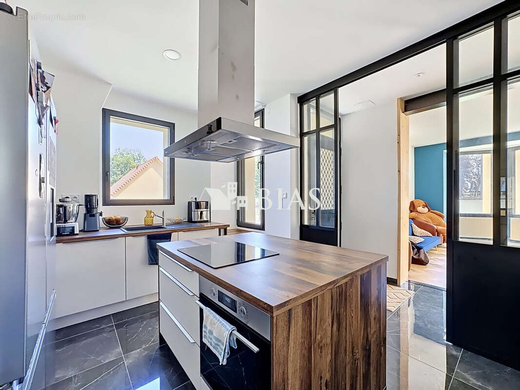 Maison 138 m² à Bourg-Achard  - photo 9