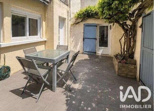 Photo 3 - Maison à CHANTELOUP-LES-VIGNES