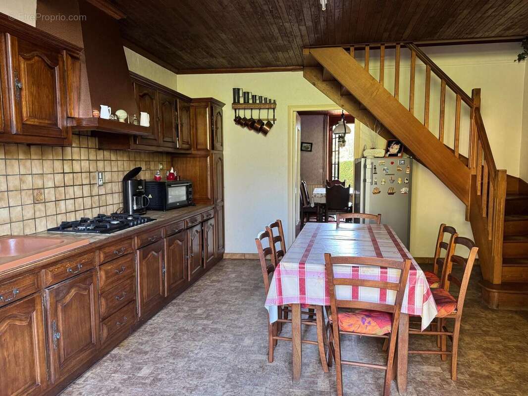 Photo 2 - Maison à LES SALLES-LAVAUGUYON