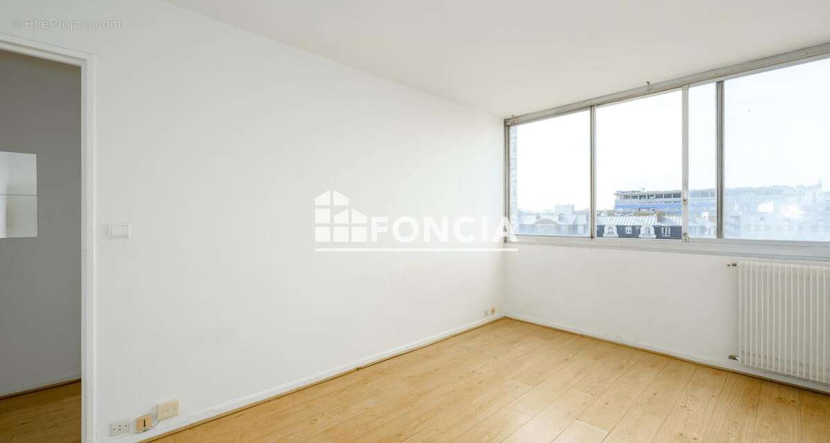 Porte de choisy - 2 pieces (43 m2) vue degagee - cave et parking - photo 7