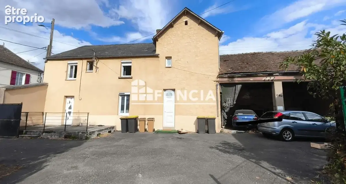 Immeuble de 2 appartements et une maison en centre ville de Dordives - photo 7
